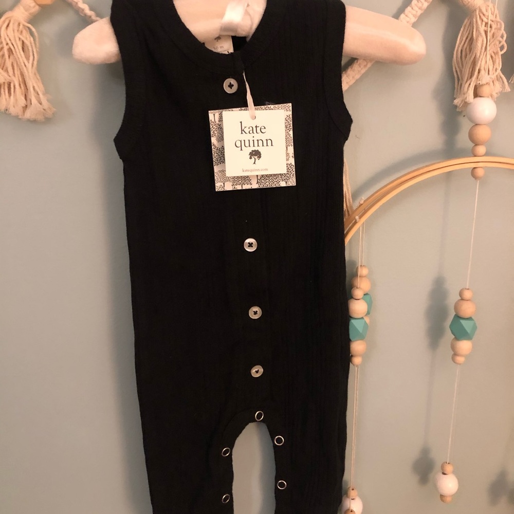 Kate Quinn black one piece sleeveless